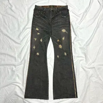 obelisk fringe damage flare denim