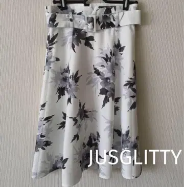 JUSGLITTY 저스길리티 벨트 포함 꽃무늬 플레어 스커트
