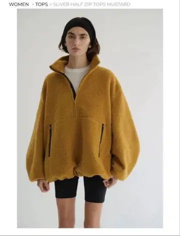 clane sliver half zip tops