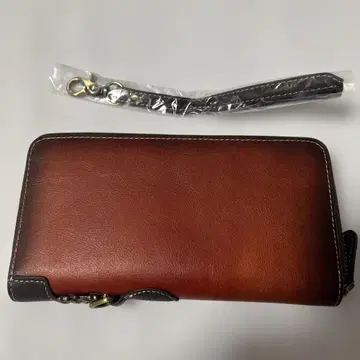 적갈색, 브라운 색상의 가죽 장지갑, 지퍼 있음, 스트랩 포함