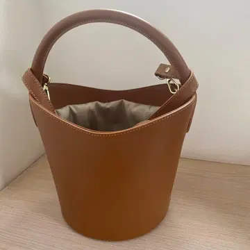 미로스의 브라운 버킷형 핸드백