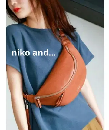 니코앤드 niko and 브라운 합성 피혁 바디백 태슬 포함
