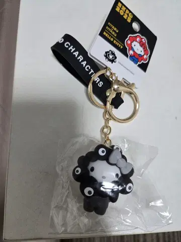 키티 오사카 만박 산리오 블랙 미야쿠미야쿠 변신 키링