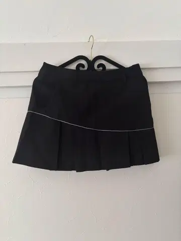 데상트 프릴 스커트