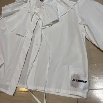 새상품급 JIL SANDER 프릴 장식 화이트 셔츠