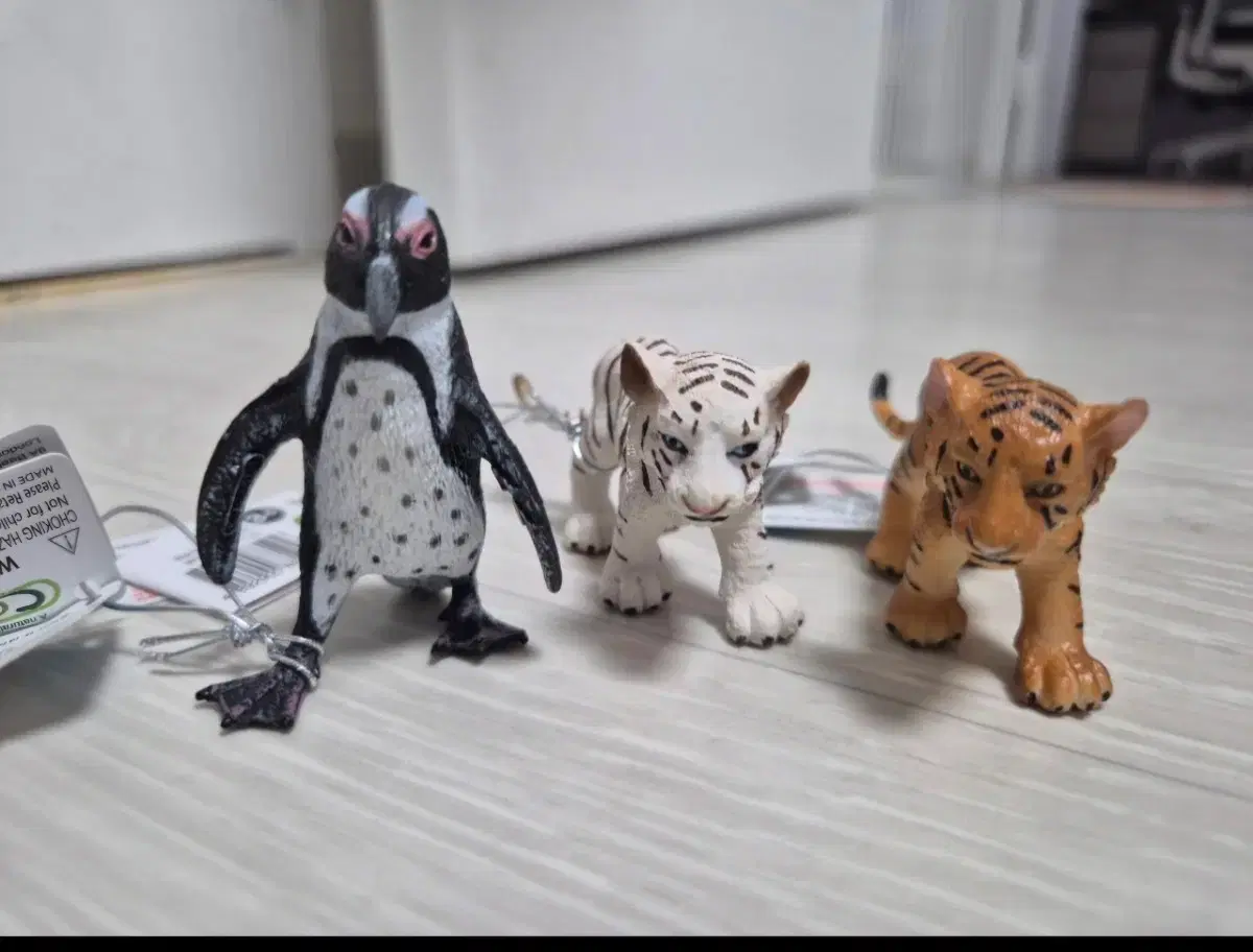 Collecta figures that children will love (baby white tiger, baby tiger, African penguin)