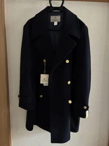 네이비 더블 브레스트 피 코트