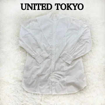 유나이티드 도쿄 앞뒤 절개 가능 하이넥 블라우스 화이트