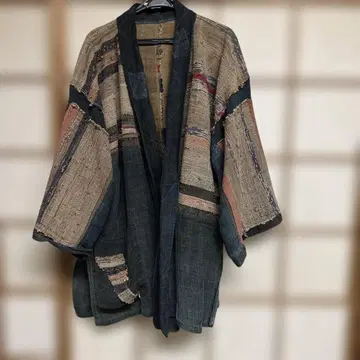 전통적인 다색 직조 겉옷