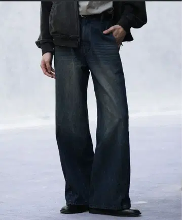 WYM CURVED FLARE DENIM SLACKS