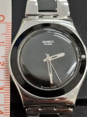 Swatch 쿼츠 손목시계 블랙