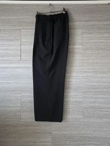 MARKAWARE 울 서바이벌 크로스 더블 플리츠