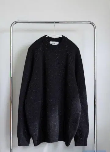 oversized low gauge speckled knit