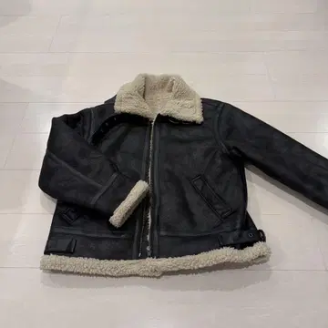 여성용 블랙 무스탕 코트