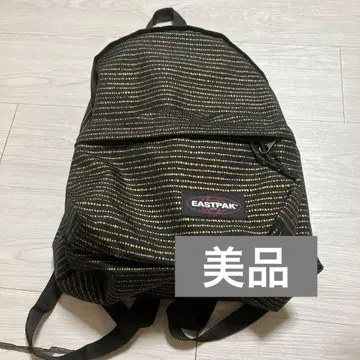 EASTPAK 블랙 골드 컬러 스트라이프 백팩