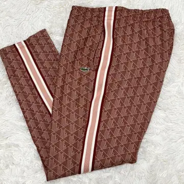LACOSTE 모노그램 자카드 트랙 팬츠 기하학 패턴