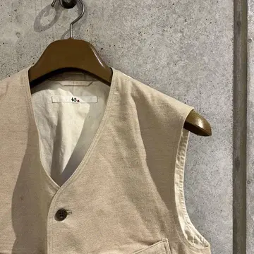 베이지 코튼 슬리브리스 베스트 45