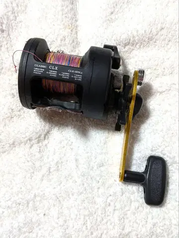 okuma Classic CLX-150La 낚시릴 블랙/골드
