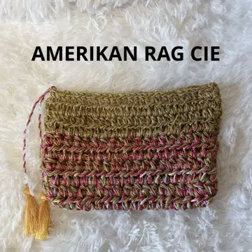 AMERIKAN RAG CIE 골드와 핑크 태슬 장식 클러치백