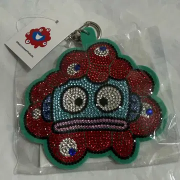 미야쿠미야쿠 변신 반짝이 가죽 키링 한교동
