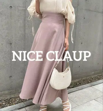 NICE CLAUP 백 레이스업 플레어 스커트
