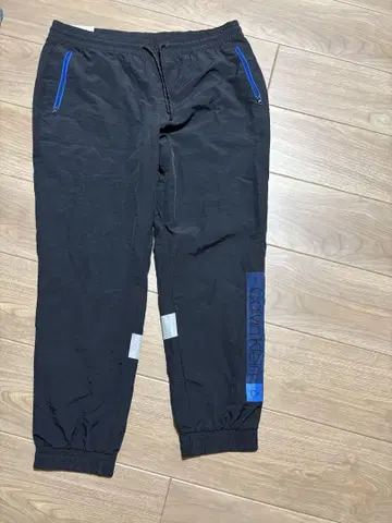 Calvin Klein 블랙 팬츠 리플렉터 조거 팬츠