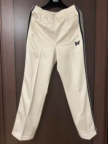 니들스 트랙 팬츠