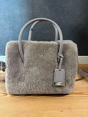 KATE SPADE 그레이 퍼 핸드백