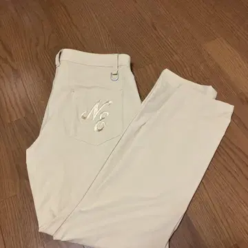 NEW ERA 베이지 슬림핏 팬츠