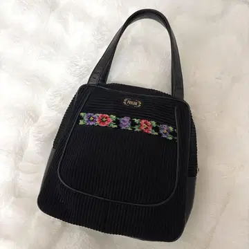 FEILER 페이러 슈니르 직조 밴드백 지퍼