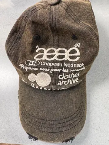aeae LOGO DAMAGED CAP [DARK BROWN]