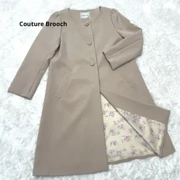 베이지 체스터 코트 버튼 포함
