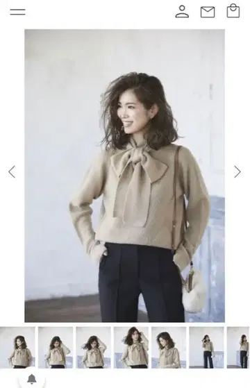 리본 포함 베이지 스웨터