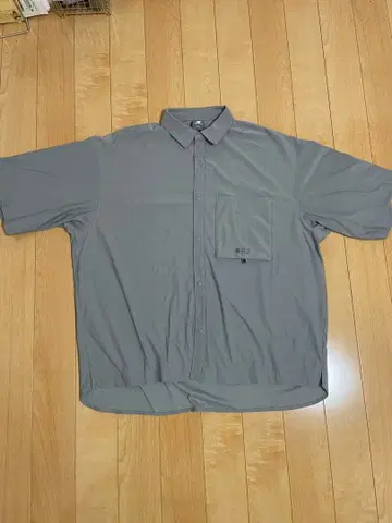 뉴발란스 Oversized Short Sleeve Shirt