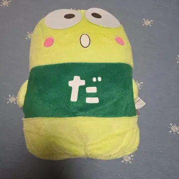 옐로우 그린 색상의 봉제 인형