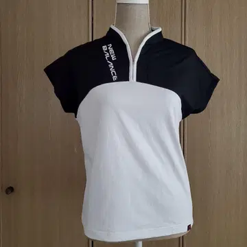 NEW BALANCE 하프 지퍼 셔츠 블랙/화이트