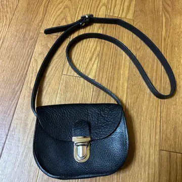 케이트 셰리던 블랙 가죽 숄더백