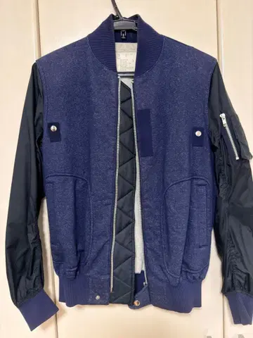 sacai MA-1 도킹 플라이트 자켓 네이비