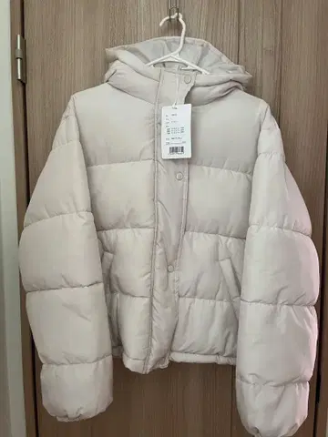 아이보리 다운 자켓 L 사이즈