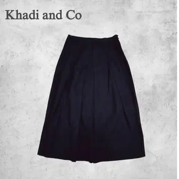 Khadi and Co 투모로우랜드 박스 플리츠 롱 스커트 블랙