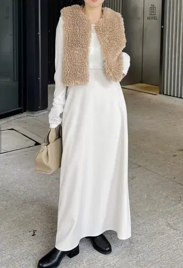 [미사용 택 포함] 컬리 퍼 베스트