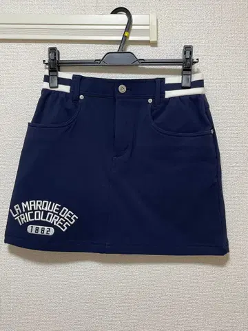 LE COQ SPORTIF 네이비 스커트
