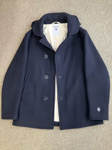 Orcival 네이비 피 코트