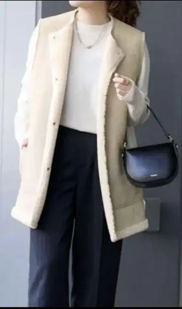 저널 스탠다드 페이크 무스탕 리버서블 베스트