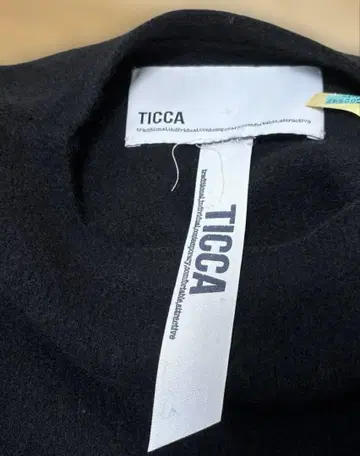 TICCA 울 스웨터