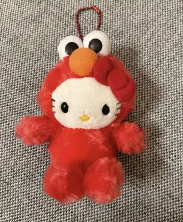 세서미 스트릿 인형옷 키티 40주년 콜라보 엘모 변신 마스코트