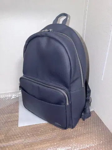 라코스테 LACOSTE 클래식 포켓 백팩 럭색