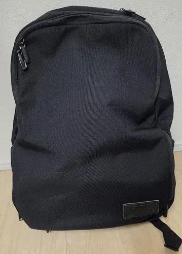 콜맨 아웃비즈 백팩 슬림 블랙