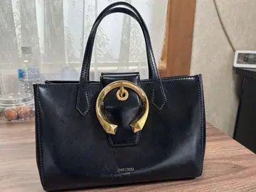 JIMMY CHOO 블랙 가죽 핸드백