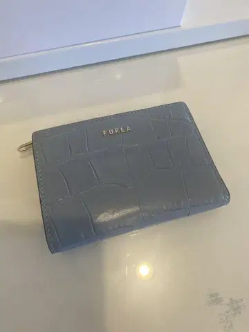FURLA 라이트 블루 접이식 지갑